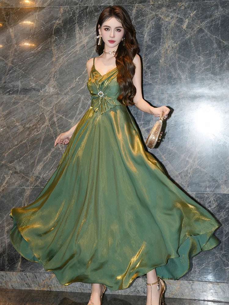 Metallic Green Sleeveless Gown with Bow Accent